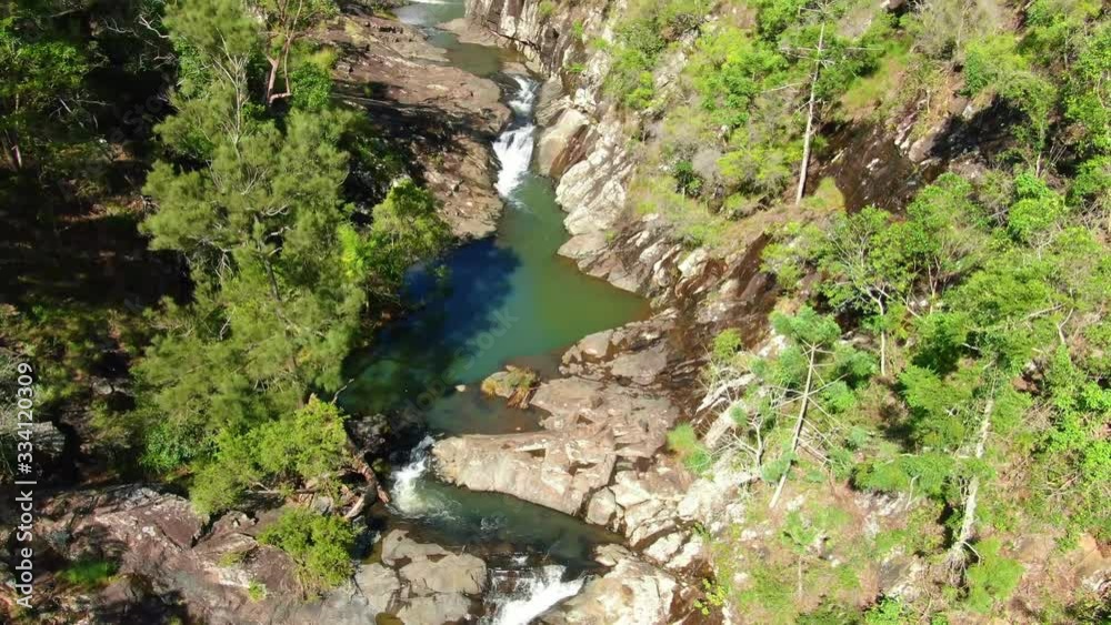 High drone shot of Cedar Creek Falls,Australia, Bushland in summer,spectacular High drone shot of Cedar Creek Falls,Australia, Bushland in summer,spectacular