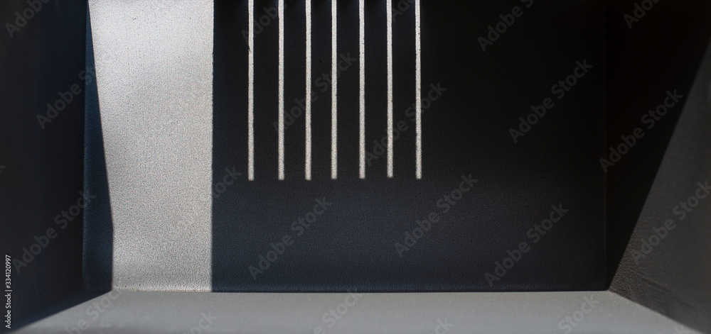 Light and shadow in a black room with space