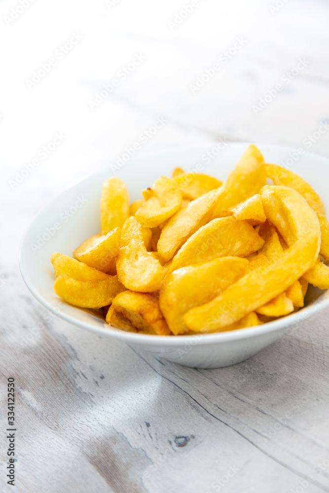 Golden French fries potatoes ready to be eaten Golden French fries potatoes ready to be eaten