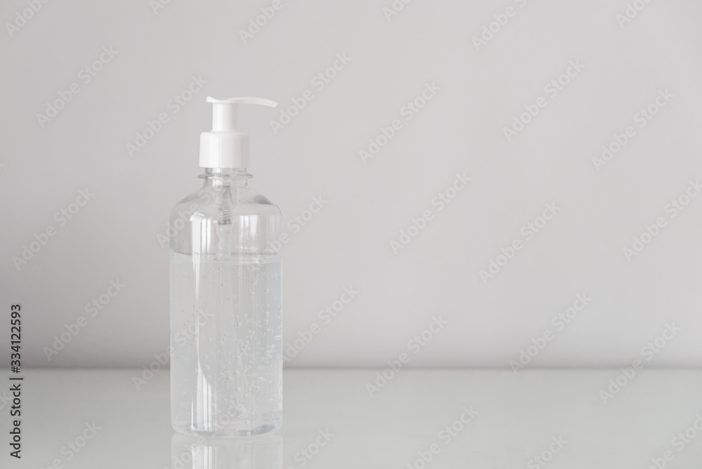 Plastic bottle pump with alcohol gel on the table with copy space. For cleaning hand and clear bacteria for stop corona virus outbreak. Protection against the virus, Covid 19, coronavirus 2019. Plastic bottle pump with alcohol gel on the table with copy space. For cleaning hand and clear bacteria for stop corona virus outbreak. Protection against the virus, Covid 19, coronavirus 2019.