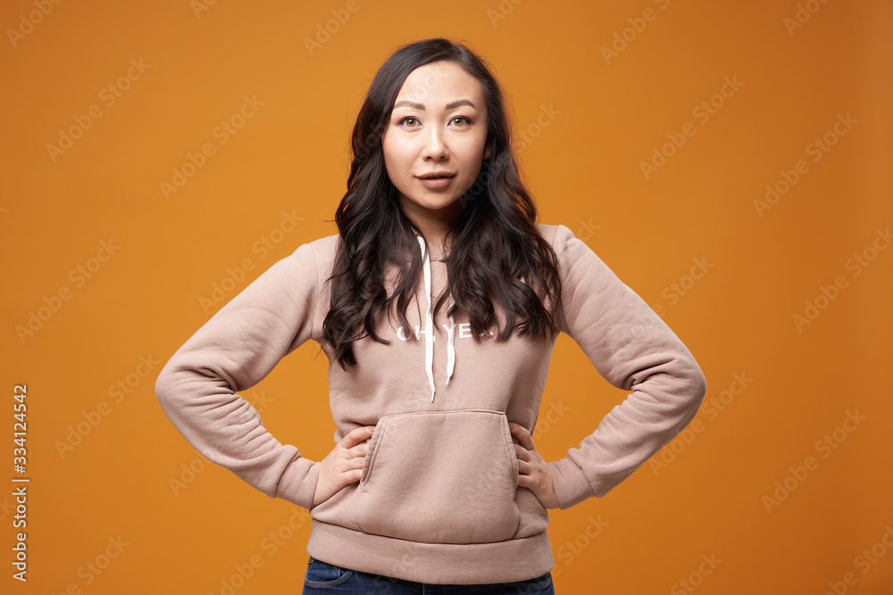 Young brunette with long hair isolated in studio Young brunette with long hair isolated in studio
