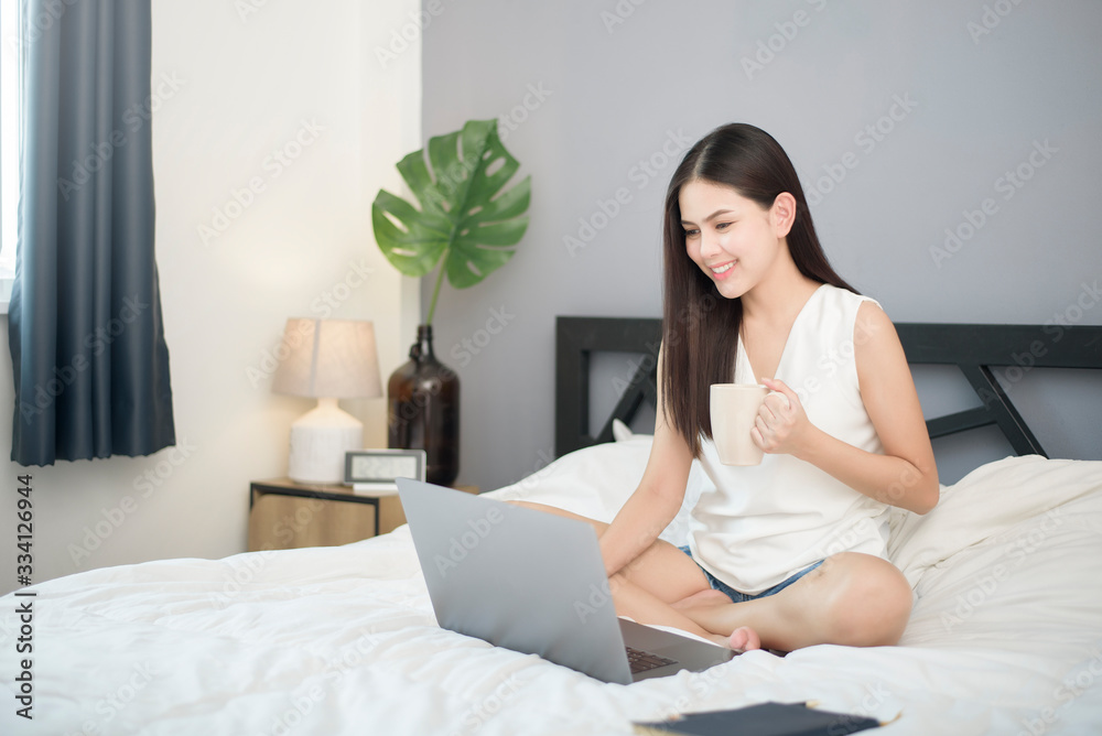 Beautiful woman is working from home Beautiful woman is working from home