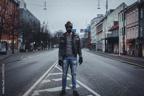 Man in mask / gas mask in the city © Milan