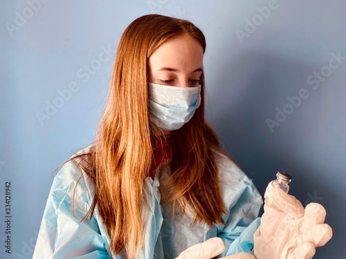 a teenage girl in a medical mask