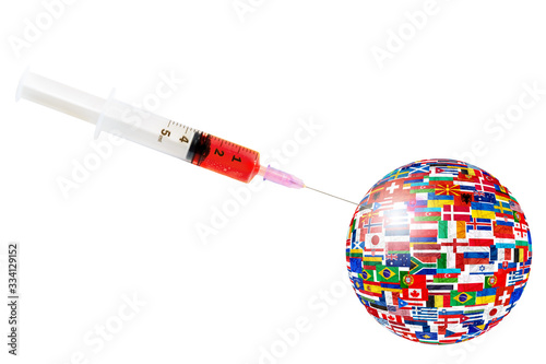Syringe with blood: positive analysis from COVID-19 and image of world with flags of countries with Coronavirus. Covid 19-NCP virus: contagion of a disease in the globe. Pandemic and viral epidemic.