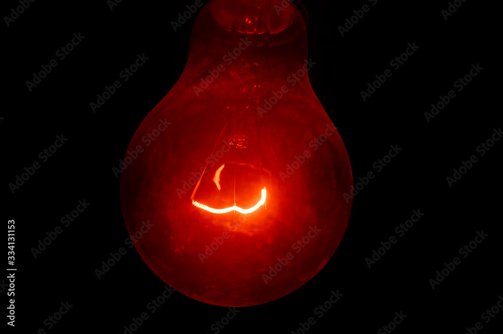 Dark red lightbulb scary darkness Dark red lightbulb scary darkness