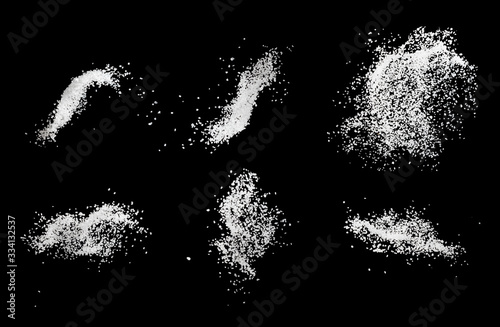 Set of sea salt splash explosion isolated on black background close up, freeze motion