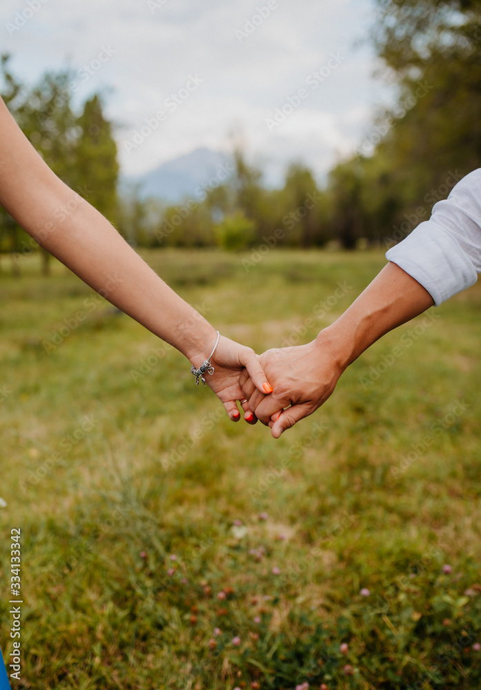 hands together man and woman hands together man and woman