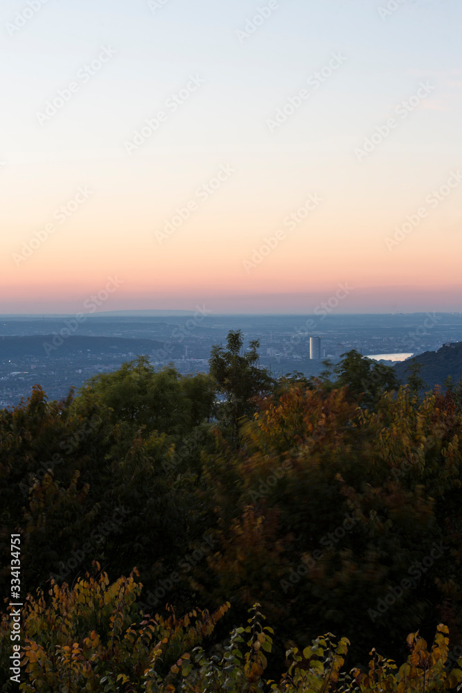 Skyline over the Rhine into a German low mountain range at sunset