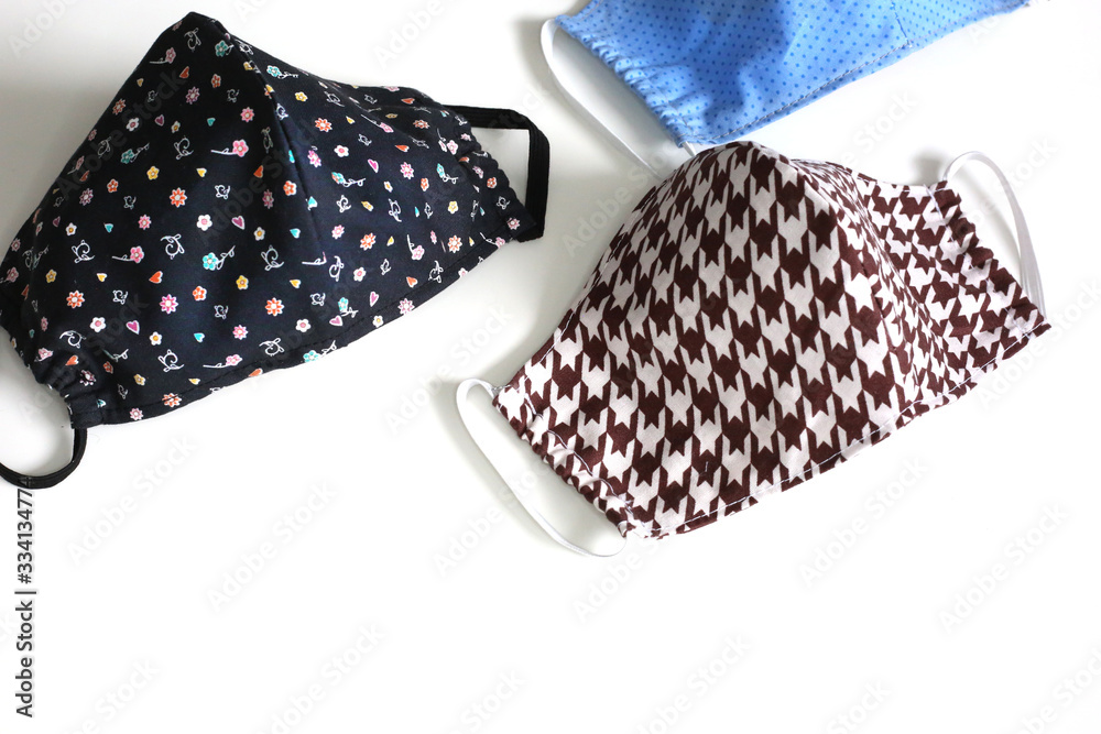 Many cotton face mask against dust and virus top view. Coronavirus preventive cotton mask. Many cotton face mask against dust and virus top view. Coronavirus preventive cotton mask.