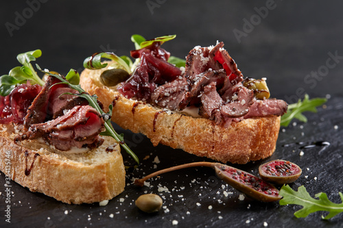 canape with meat  and vegetables