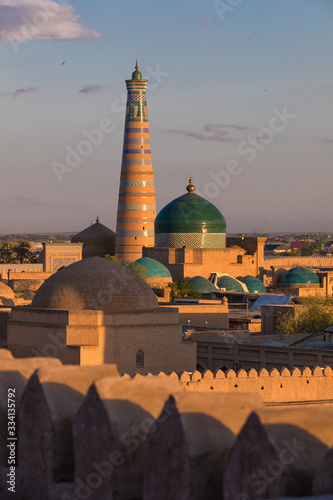 Mosques and minarets in Khiva Uzbekistan at sunset