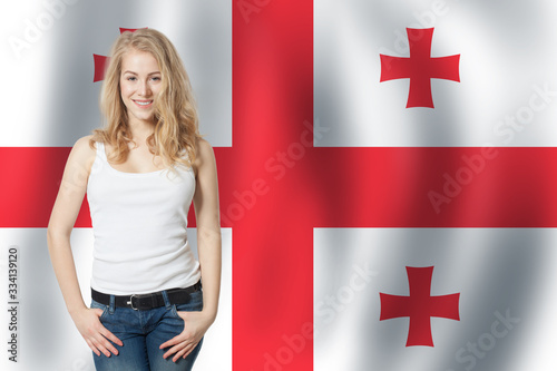 Happy girl student with Georgia flag background