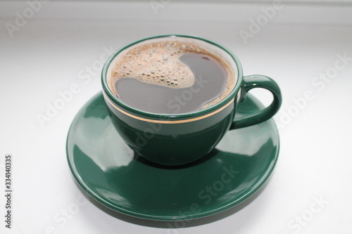 black coffee green cup