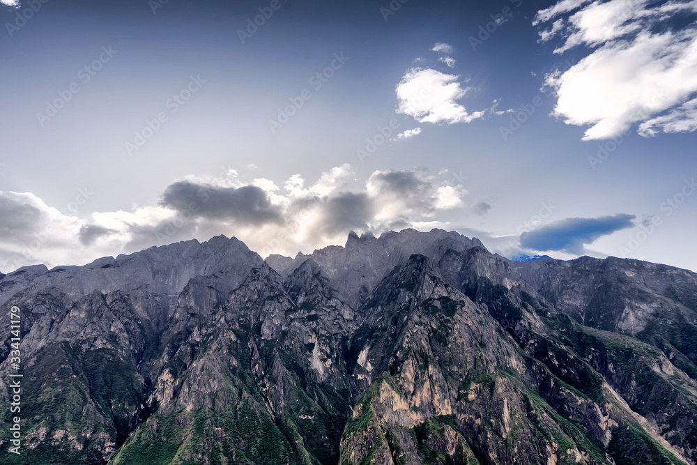 Panoramic top view of the Jade Dragon Snow Mountain on the hiking trails of the Tiger Leaping Gorge, Lijiang Yunnan, China