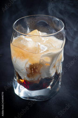 creative cocktail on the dark background