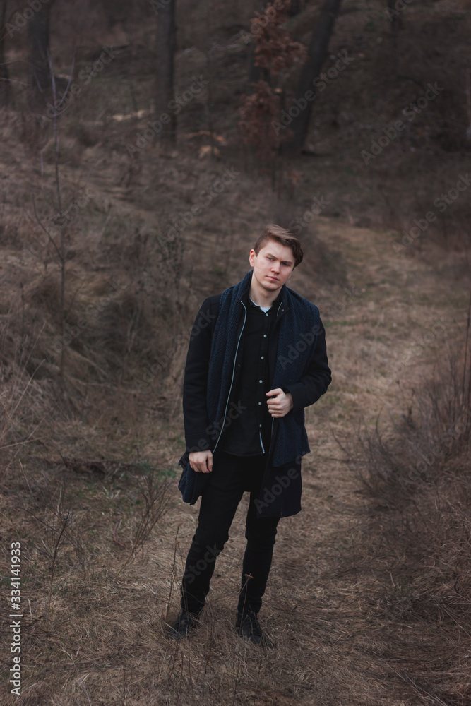 Man in black suit. Elegant businessman outdoors Man in black suit. Elegant businessman outdoors