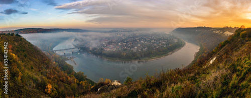 Panoramic view on Zalishchyky city and Dniester river meander and canyon at dawn