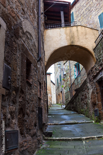 The narrow streets amidst stone walls