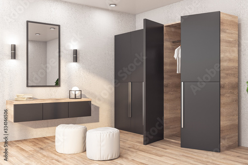 Modern wardrobe with clothes