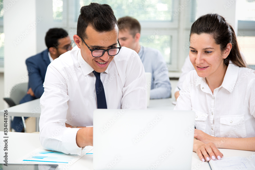 Business people working together in the office Business people working together in the office