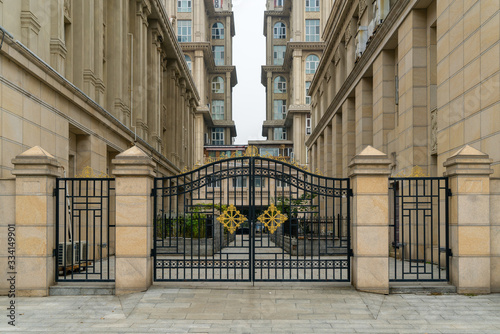 Iron gate at the entrance of residential building in residential area