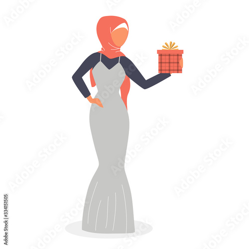 Muslim woman holding gift box
