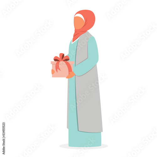 Muslim woman holding gift box