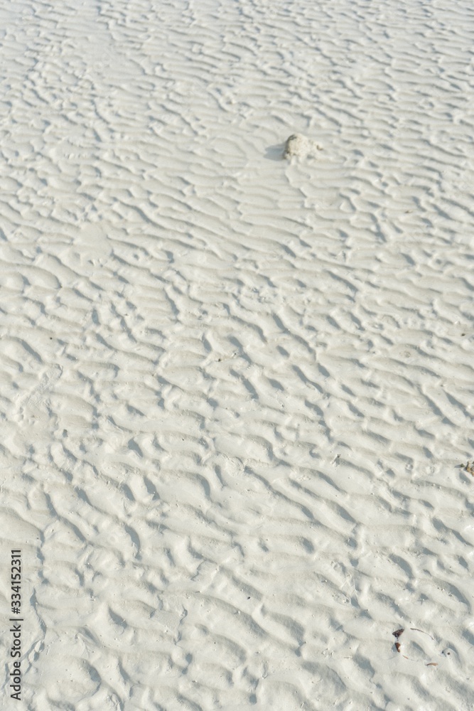 White wavy send on a beach with beautiful texture White wavy send on a beach with beautiful texture