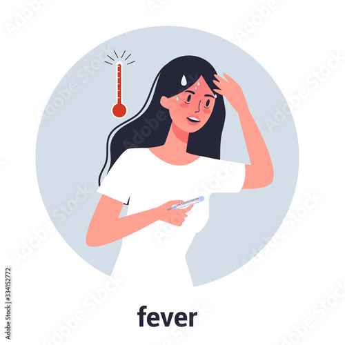 Woman in fever with a high temperature as a symptom of flu, cold. photo