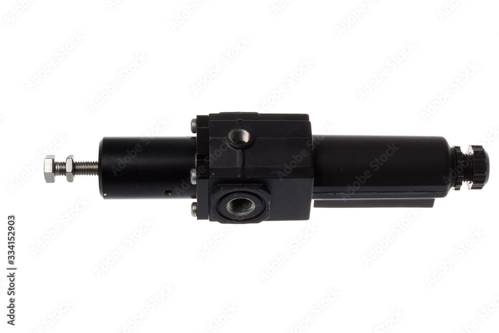 Black filter regulator for compressed air with place for manometer and hex screw regulation, isolated on white background