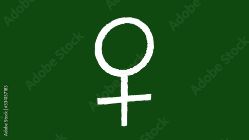 Chalk drawn image of a female symbol. Gender symbol drawn on a school blackboard.