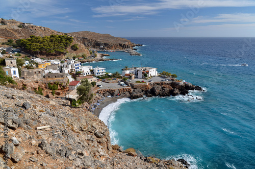 Top view of Vrissi beach and the town of Hora Sfakion (Sfakia) on the south coast of the island of Crete, Greece.  photo