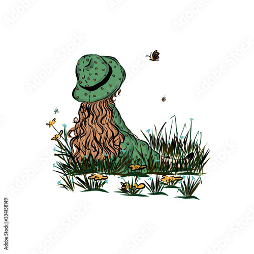Little girl with long hair in hat sits on the grass and admiring nature. 