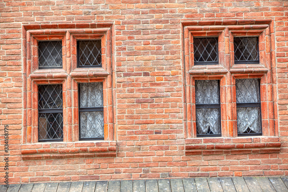 windows and bricks wall of old town 