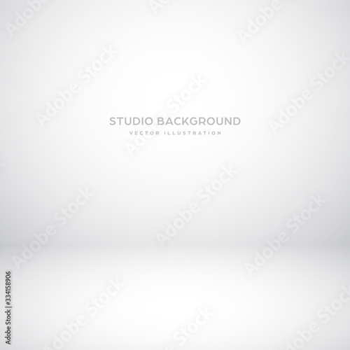 Empty gray studio abstract background with spotlight effect. Product showcase backdrop.