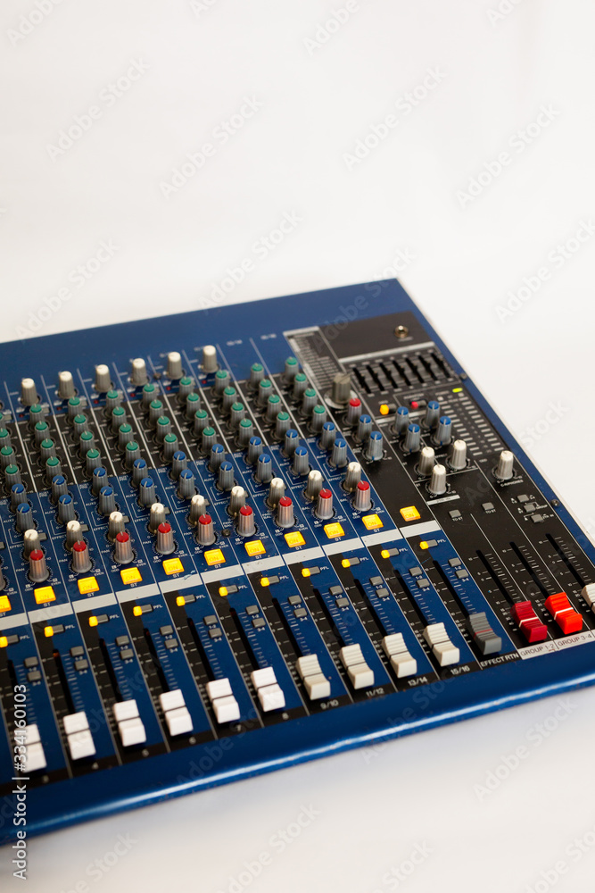 DJ mixer on a white background, music and lighting equipment DJ mixer on a white background, music and lighting equipment