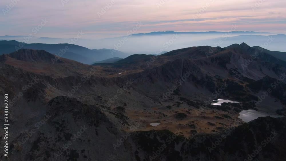 Aerial view of mountain range on sunset and two lakes Aerial view of mountain range on sunset and two lakes