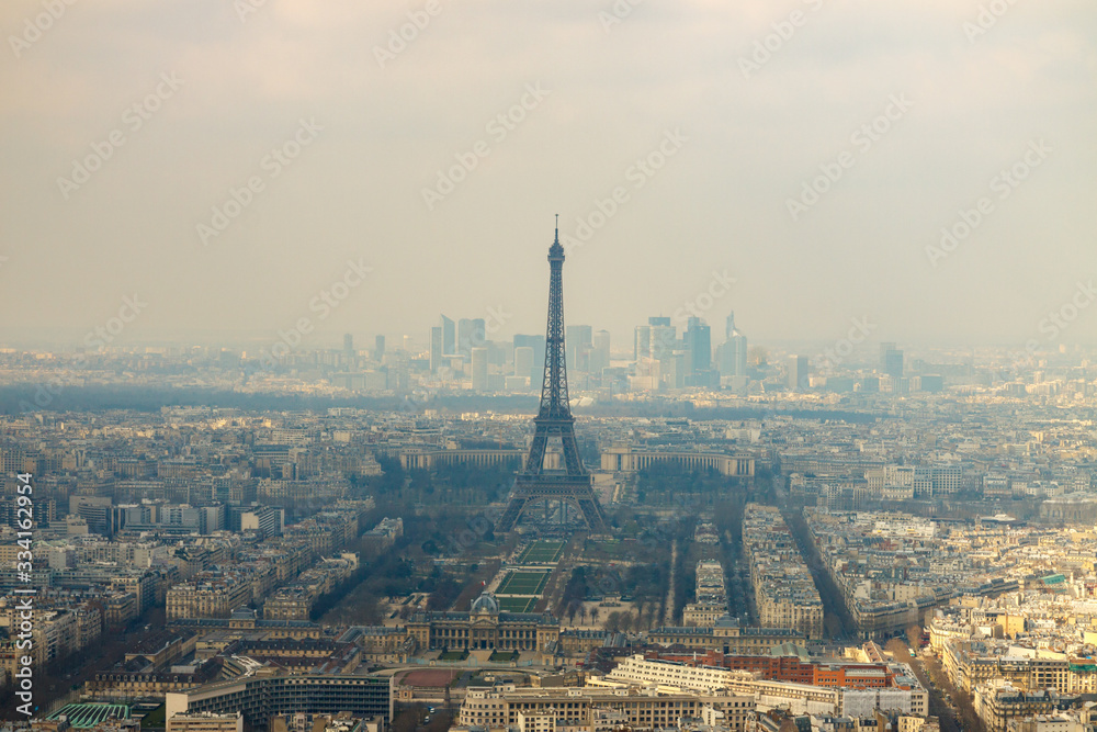 Panorama of Paris with Eiffel tower at fog