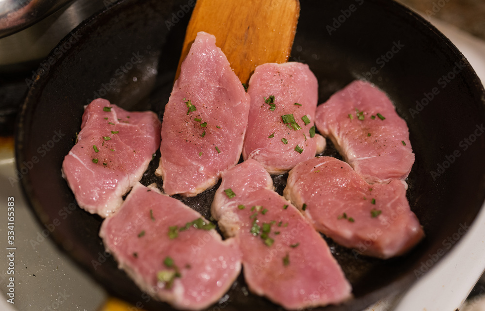 Fried meat with onion on pan. Fried meat with onion on pan.