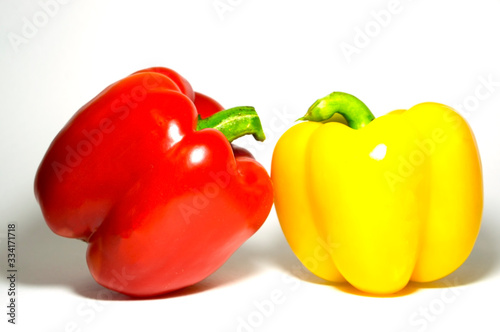 red and yellow bell peppers Paprika on a white background