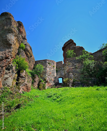 Entrance to Kaleto Fortress between rocky terrain at the Belogradchick Rocks, Bulgaria, great travel location with many amazing views and historical sites to visit in Europe photo