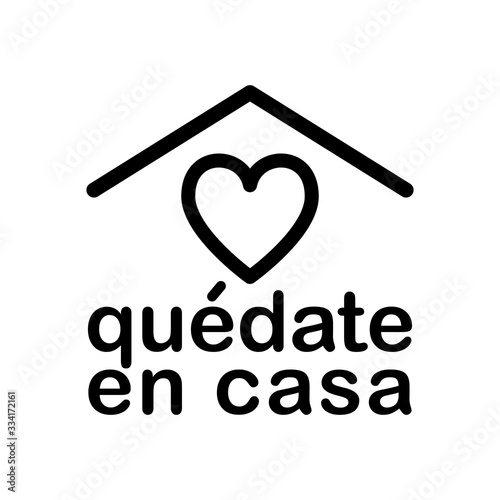 Stay Home icon in spanish language Quedate En Casa. Staying at home during pandemic print. Home Quarantine illustration photo
