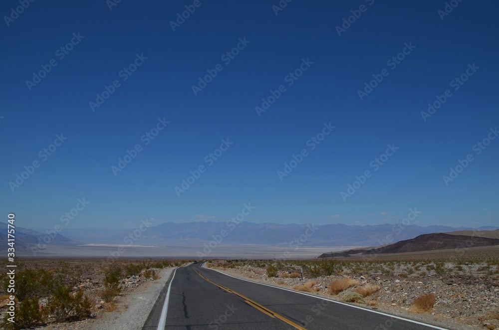 Scenic, empty road through the Mojave desert, California