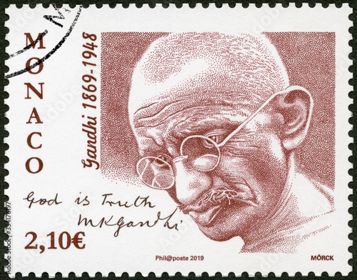 MONACO - 2019: shows portrait of Mahatma Mohandas Karamchand Gandhi (1869-1948), God is Thruth, 2019 photo