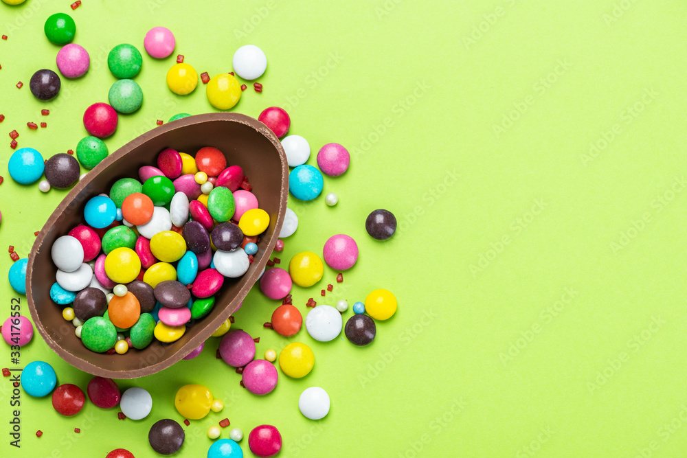 Easter Egg with Colorful Candy. Easter Background with Copy Space