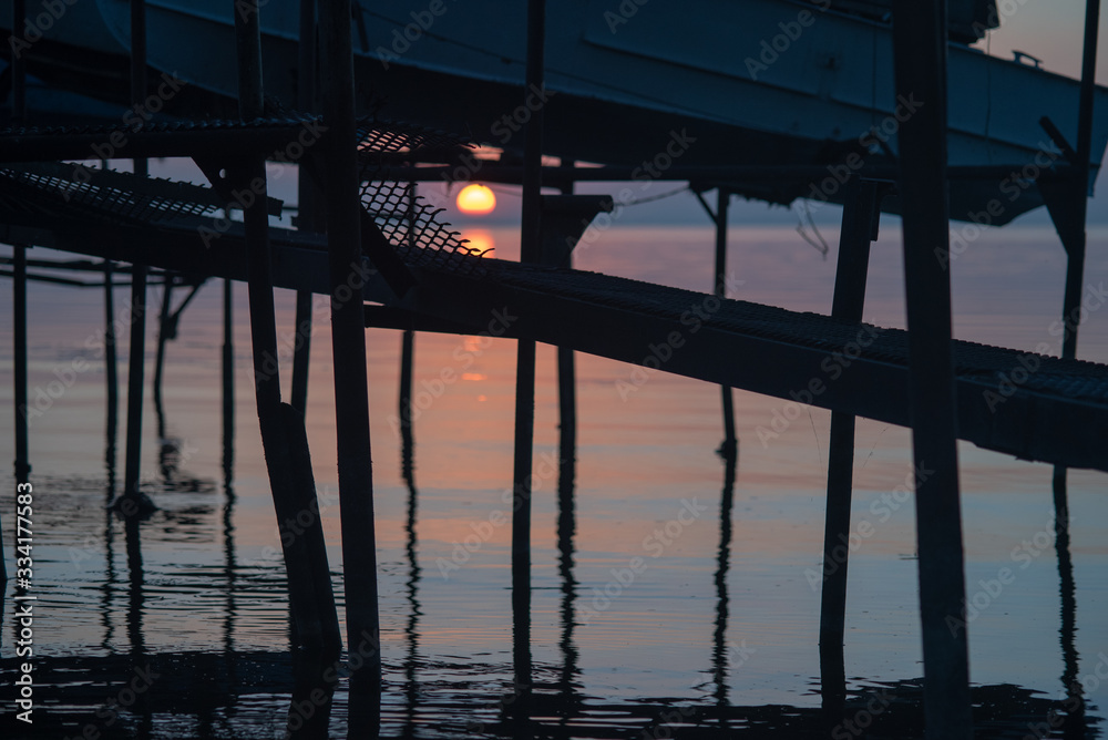 warm sunset at the old boat station warm sunset at the old boat station