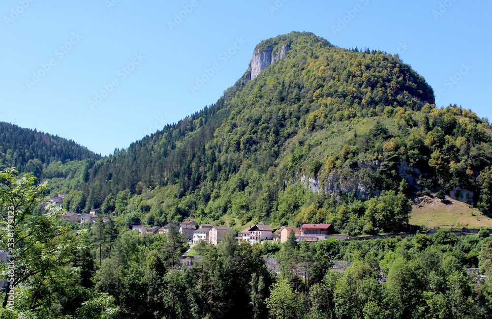 View of the picturesque town of Sainte Claude and surrounding scenery in the Haut Jura region of France. St. Claude is the largest town in the region.