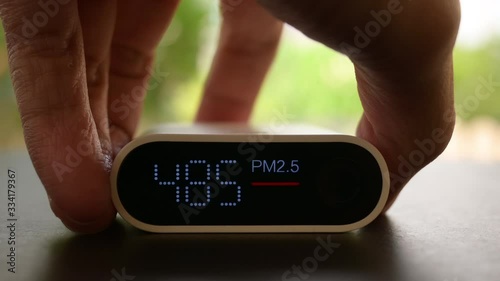 particle measuring pm2.5 in air with smog pollution contaminated in nature