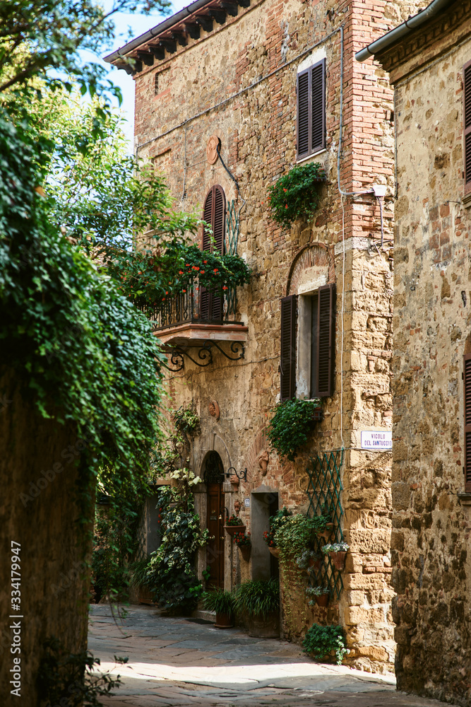 Medieval street in old Italian hill town. Tuscany, Italy